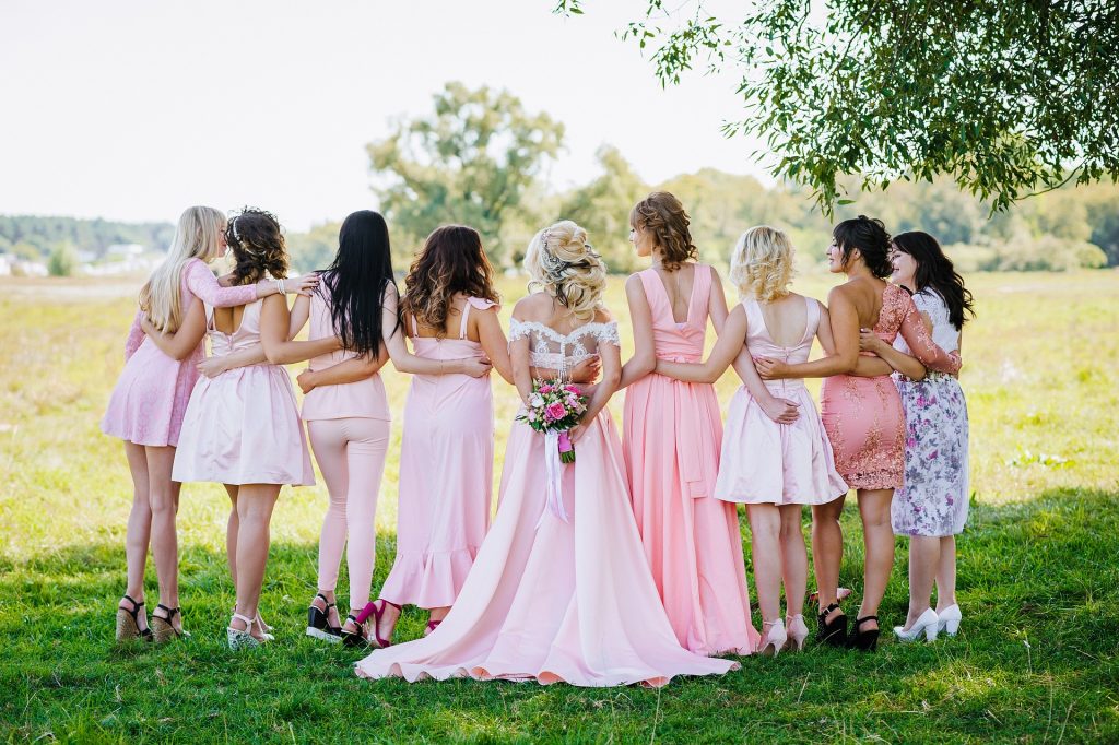 Wedding Trends 2023 via Pinterest & Zola - Mismatched Bridesmaid dresses & Pink.
